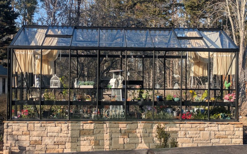 Royal Victorian VI36 all-glass greenhouse on a stone knee wall in Forsyth County, GA