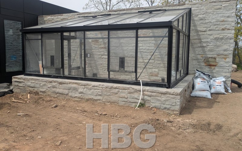 Arcadia Plus lean-to greenhouse built by HBGreenhouses in Henderson County, NC